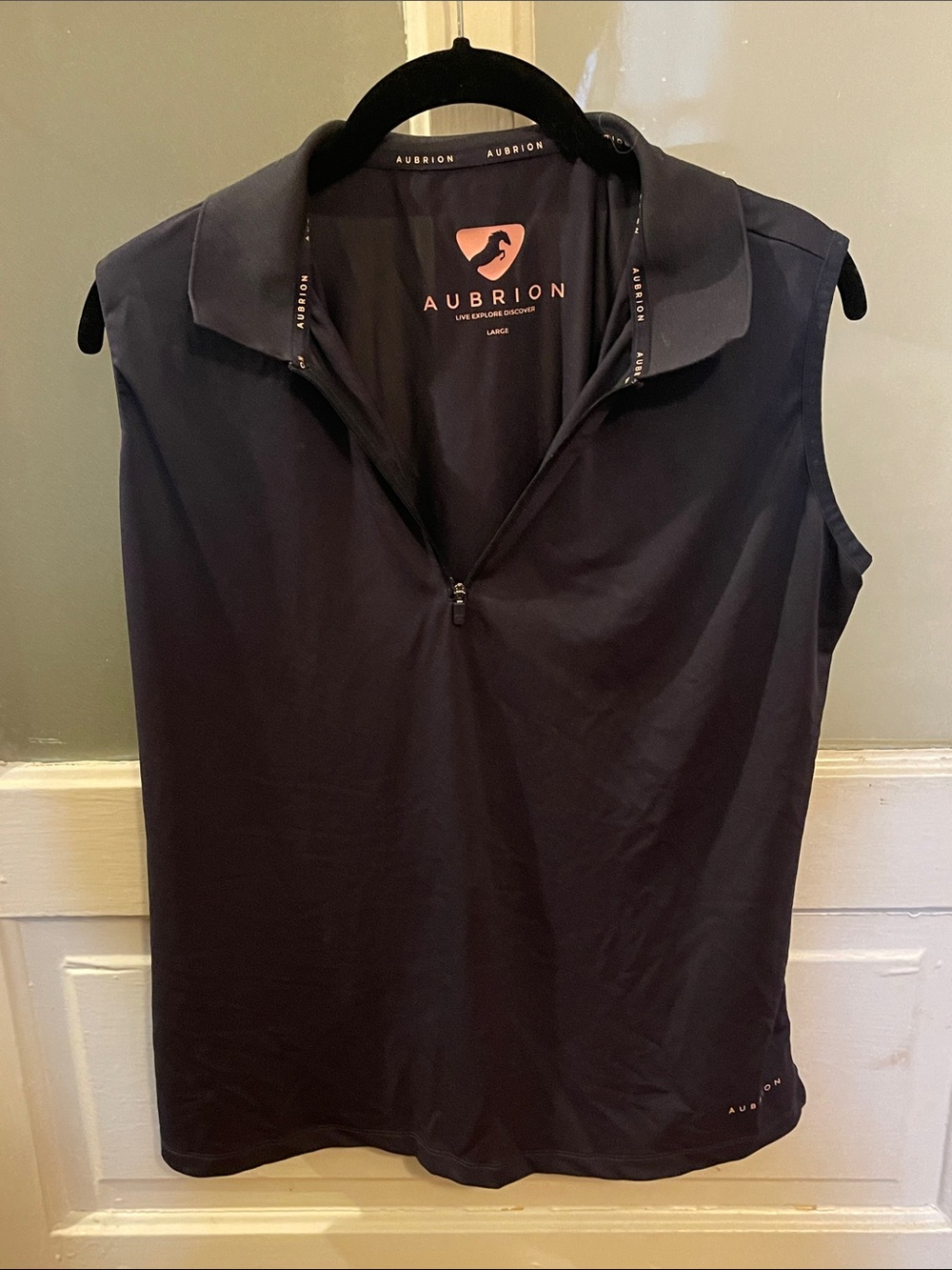 Shire’s navy sleeveless equestrian tech shirt large